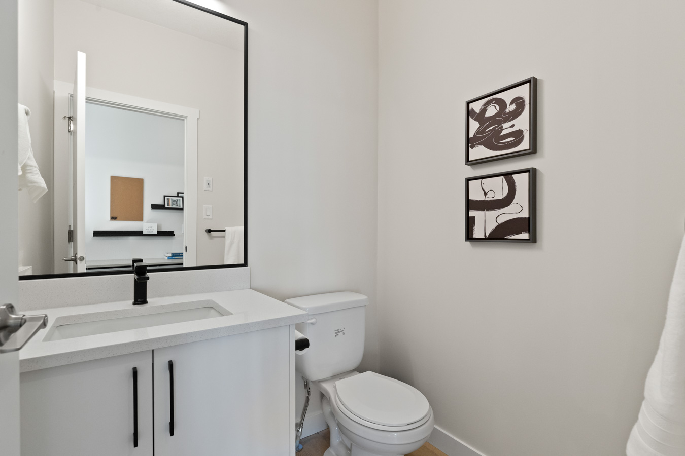 Main-floor powder room with modern finishes