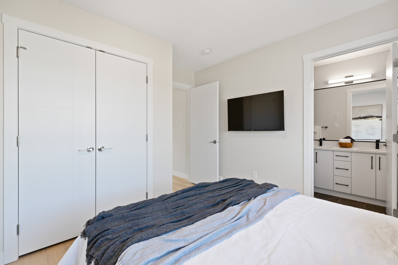 Primary bedroom with closet and ensuite access