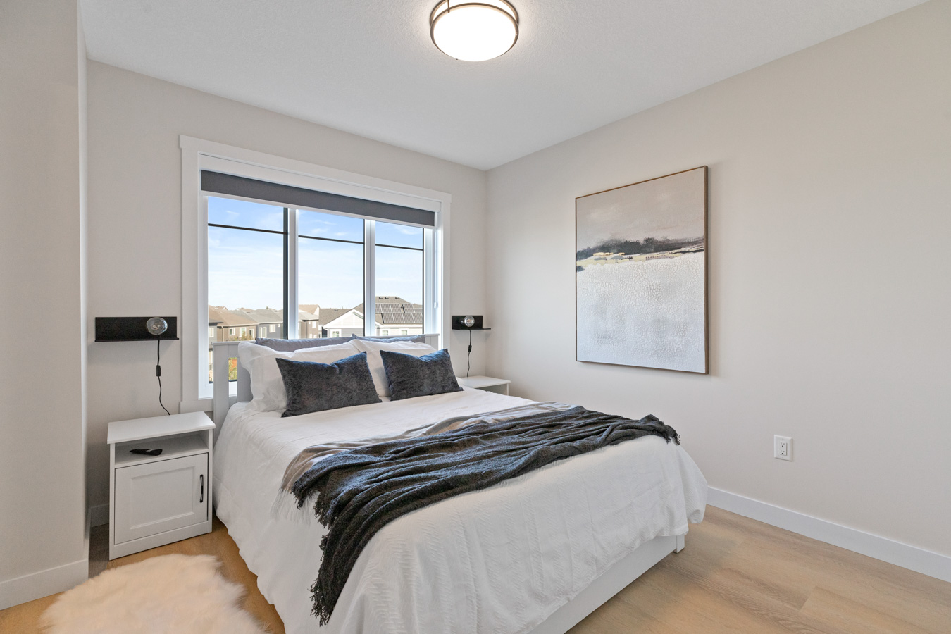 Bright primary bedroom in a Cherry Hills townhome